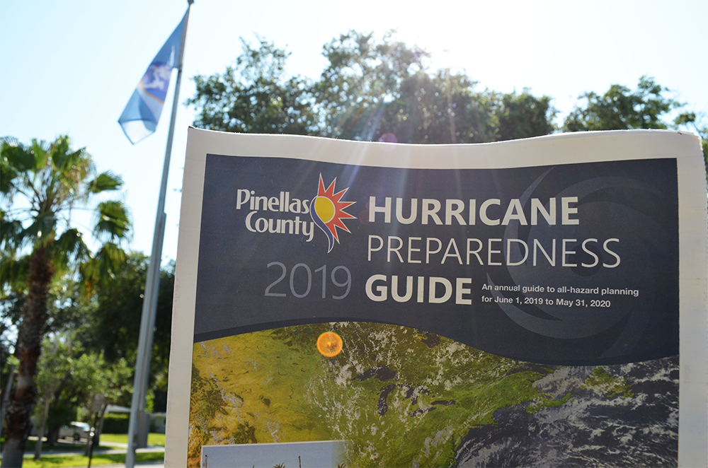 A copy of Pinellas County's 2019 Hurricane Preparedness Guide outside in front of Town Hall