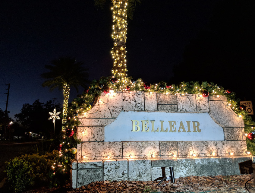 The entrance to Belleair at Ponce de Leon Boulevard, decorated with holiday lights and garland, with