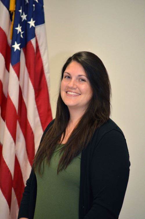 Kelly Flowers, Recreation Programmer, smiling in a formal photo.