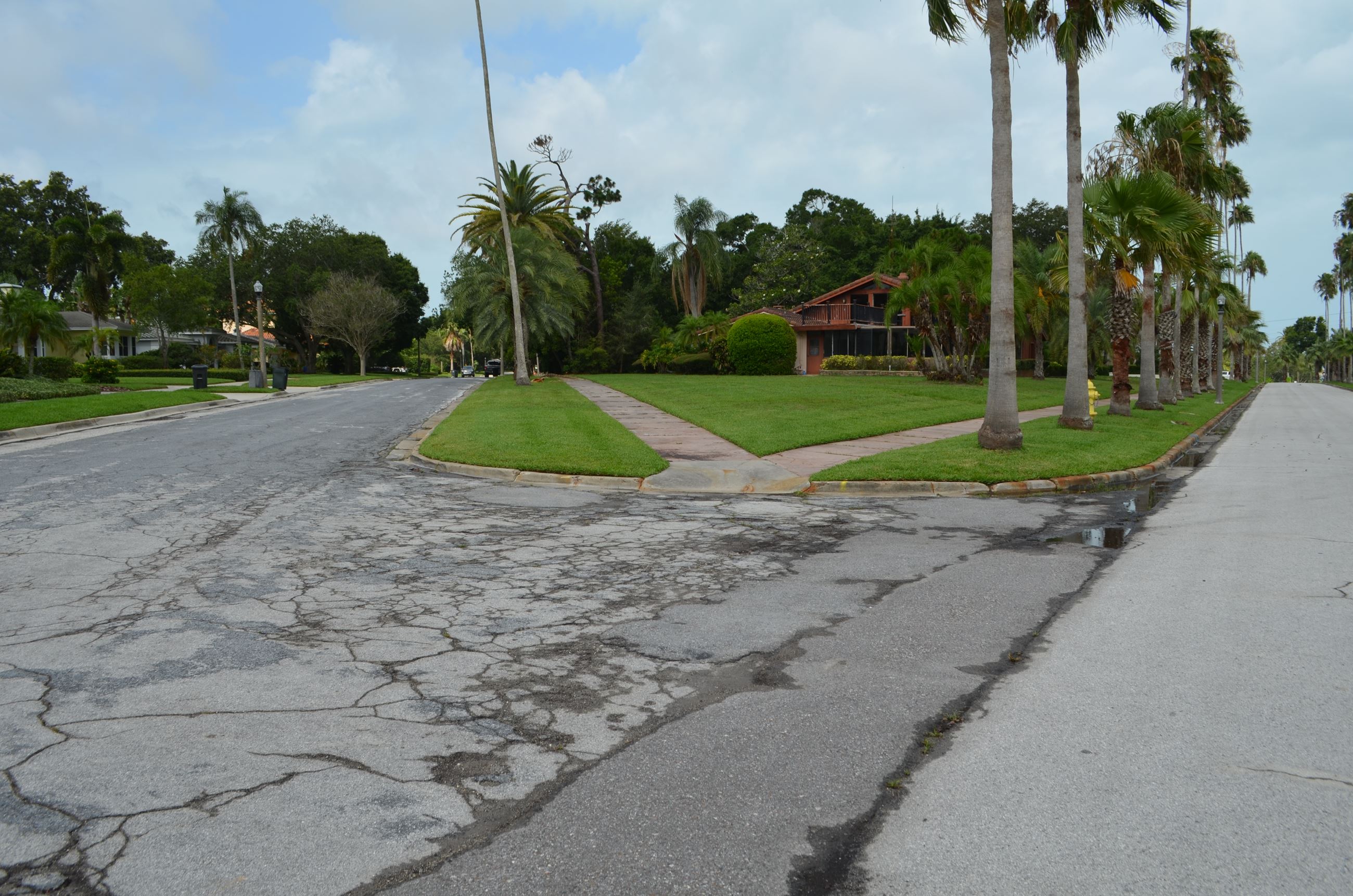 A view of Palmetto Road from Bayview Drive facing east shows the poor condition of the roadway